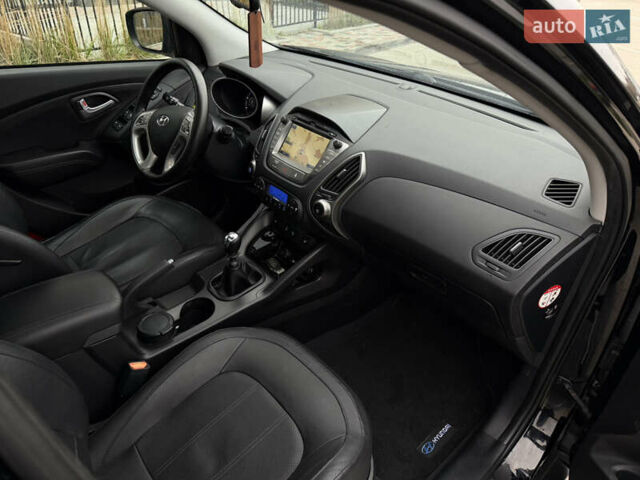 Чорний Хендай іх35, об'ємом двигуна 2 л та пробігом 240 тис. км за 15499 $, фото 12 на Automoto.ua