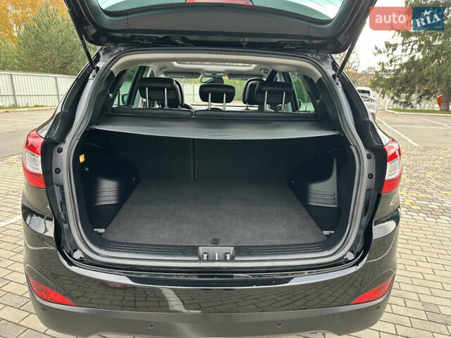 Чорний Хендай іх35, об'ємом двигуна 2 л та пробігом 164 тис. км за 17100 $, фото 36 на Automoto.ua