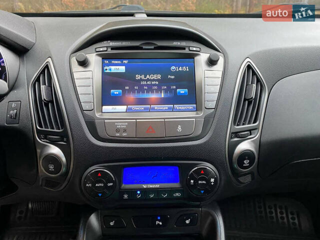 Чорний Хендай іх35, об'ємом двигуна 2 л та пробігом 160 тис. км за 15599 $, фото 42 на Automoto.ua