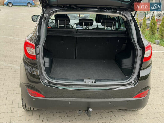 Чорний Хендай іх35, об'ємом двигуна 2 л та пробігом 240 тис. км за 15800 $, фото 17 на Automoto.ua