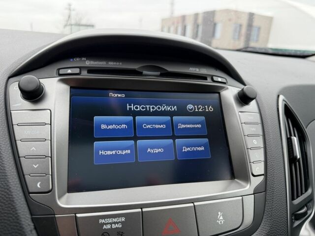 Чорний Хендай іх35, об'ємом двигуна 2 л та пробігом 240 тис. км за 14999 $, фото 16 на Automoto.ua