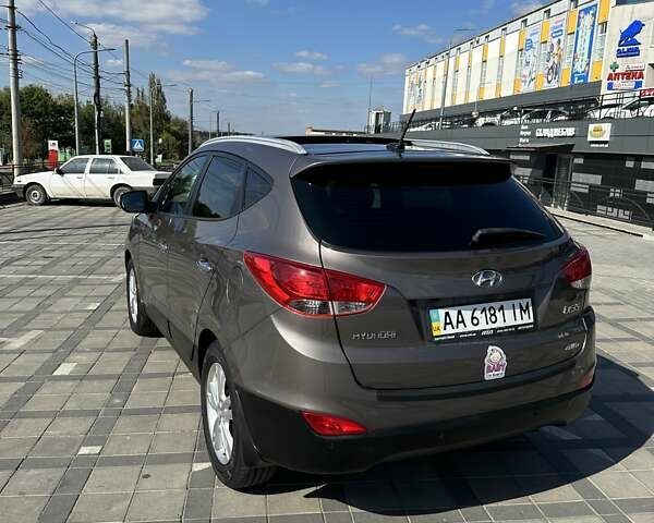 Коричневий Хендай іх35, об'ємом двигуна 2 л та пробігом 164 тис. км за 12500 $, фото 10 на Automoto.ua