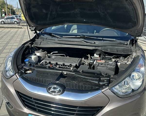 Коричневий Хендай іх35, об'ємом двигуна 2 л та пробігом 164 тис. км за 12500 $, фото 36 на Automoto.ua