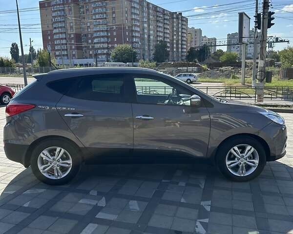Коричневий Хендай іх35, об'ємом двигуна 2 л та пробігом 164 тис. км за 12500 $, фото 17 на Automoto.ua