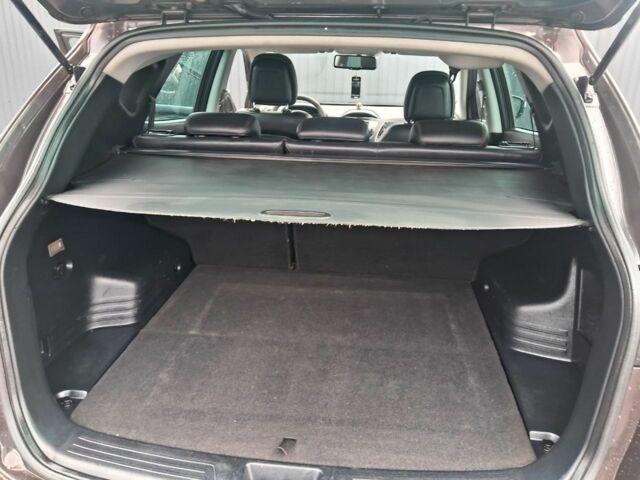 Коричневый Хендай их35, объемом двигателя 1.7 л и пробегом 309 тыс. км за 11500 $, фото 6 на Automoto.ua