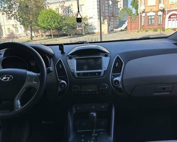Коричневий Хендай іх35, об'ємом двигуна 2 л та пробігом 164 тис. км за 12500 $, фото 68 на Automoto.ua