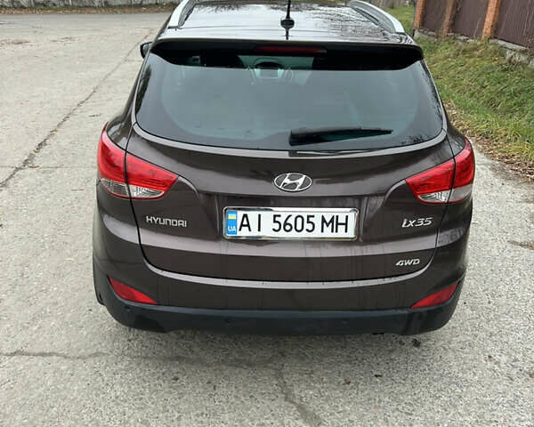 Коричневый Хендай их35, объемом двигателя 2 л и пробегом 180 тыс. км за 12300 $, фото 5 на Automoto.ua