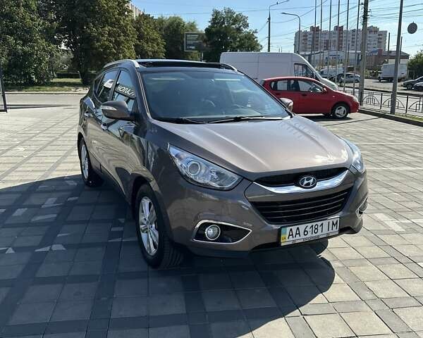Коричневий Хендай іх35, об'ємом двигуна 2 л та пробігом 164 тис. км за 12500 $, фото 5 на Automoto.ua