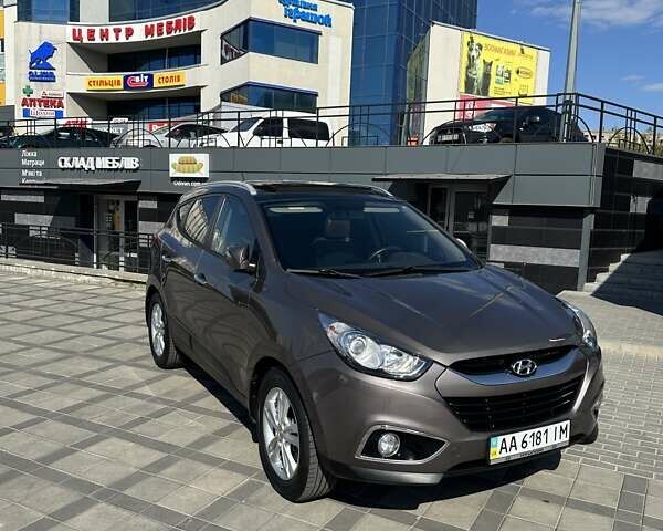 Коричневий Хендай іх35, об'ємом двигуна 2 л та пробігом 164 тис. км за 12500 $, фото 16 на Automoto.ua