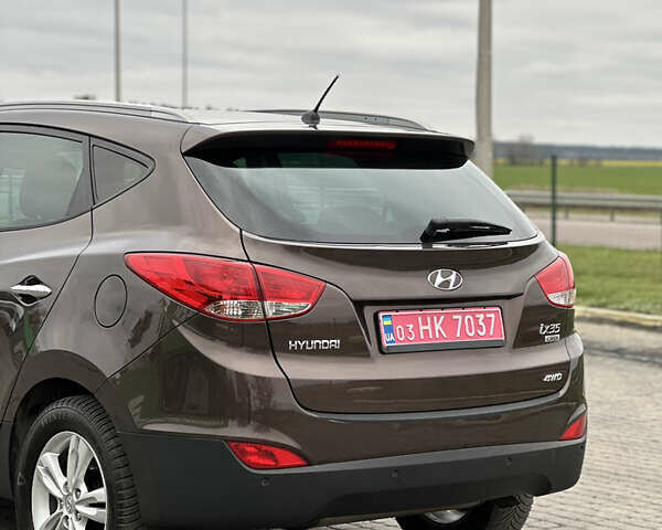 Коричневый Хендай их35, объемом двигателя 2 л и пробегом 209 тыс. км за 12200 $, фото 8 на Automoto.ua