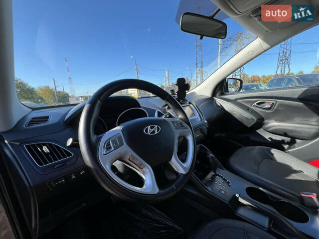 Коричневый Хендай их35, объемом двигателя 2 л и пробегом 184 тыс. км за 16450 $, фото 17 на Automoto.ua