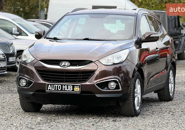 Коричневый Хендай их35, объемом двигателя 2 л и пробегом 216 тыс. км за 13900 $, фото 5 на Automoto.ua