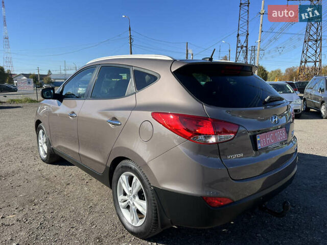 Коричневый Хендай их35, объемом двигателя 2 л и пробегом 184 тыс. км за 16450 $, фото 21 на Automoto.ua