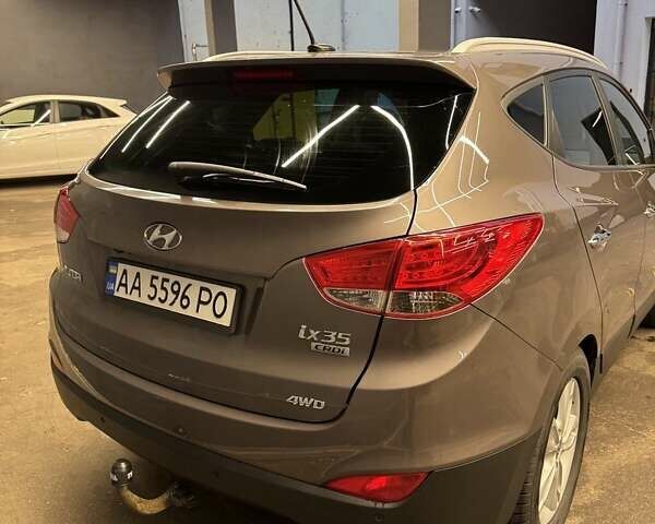Коричневий Хендай іх35, об'ємом двигуна 2 л та пробігом 226 тис. км за 11500 $, фото 3 на Automoto.ua
