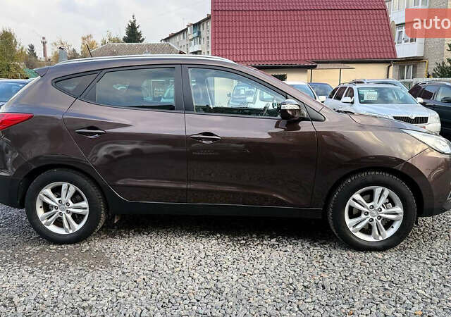 Коричневый Хендай их35, объемом двигателя 2 л и пробегом 216 тыс. км за 13900 $, фото 13 на Automoto.ua