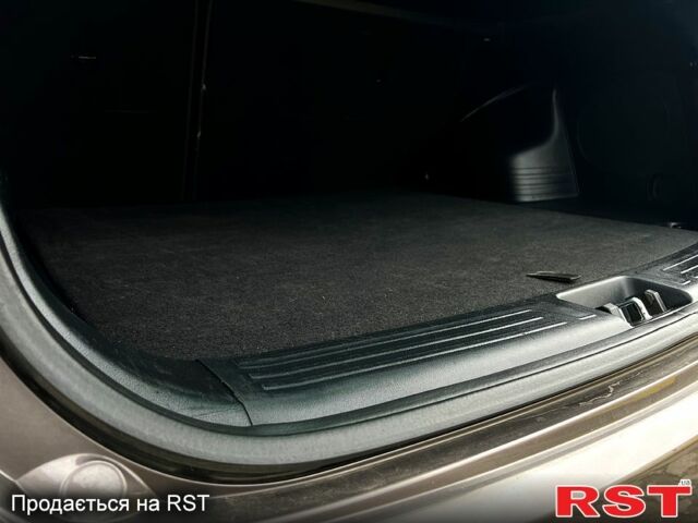 Коричневий Хендай іх35, об'ємом двигуна 2 л та пробігом 301 тис. км за 13500 $, фото 2 на Automoto.ua