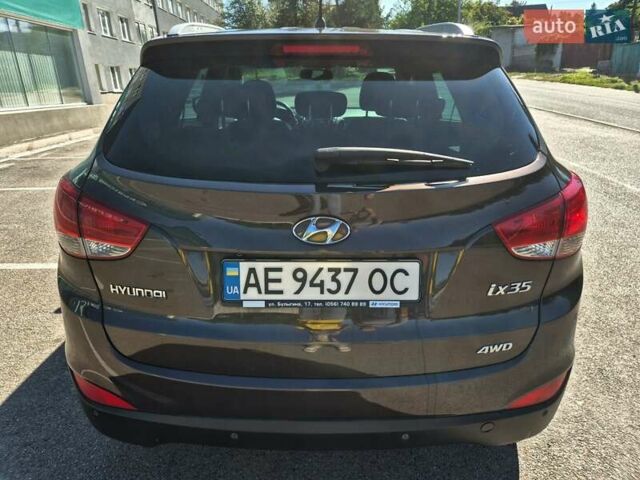 Коричневый Хендай их35, объемом двигателя 2 л и пробегом 115 тыс. км за 13000 $, фото 1 на Automoto.ua