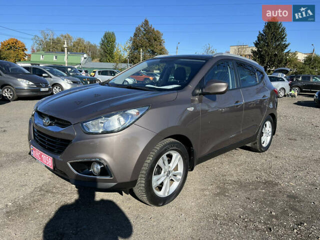 Коричневый Хендай их35, объемом двигателя 2 л и пробегом 184 тыс. км за 16450 $, фото 1 на Automoto.ua