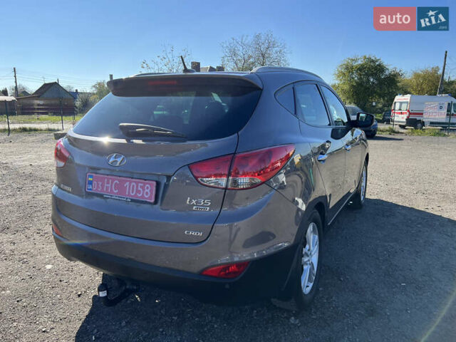 Коричневый Хендай их35, объемом двигателя 2 л и пробегом 184 тыс. км за 16450 $, фото 2 на Automoto.ua