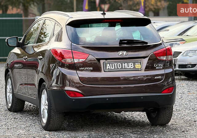 Коричневый Хендай их35, объемом двигателя 2 л и пробегом 216 тыс. км за 13900 $, фото 7 на Automoto.ua