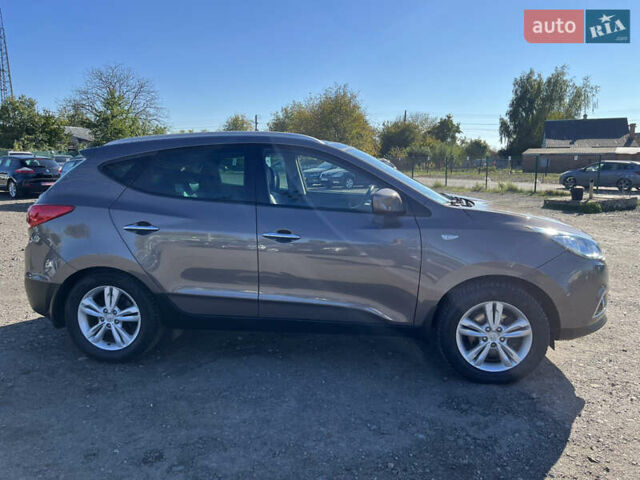 Коричневый Хендай их35, объемом двигателя 2 л и пробегом 184 тыс. км за 16450 $, фото 16 на Automoto.ua