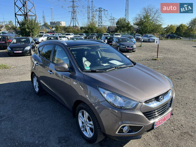 Коричневый Хендай их35, объемом двигателя 2 л и пробегом 184 тыс. км за 16450 $, фото 3 на Automoto.ua