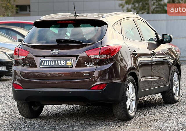 Коричневый Хендай их35, объемом двигателя 2 л и пробегом 216 тыс. км за 13900 $, фото 11 на Automoto.ua