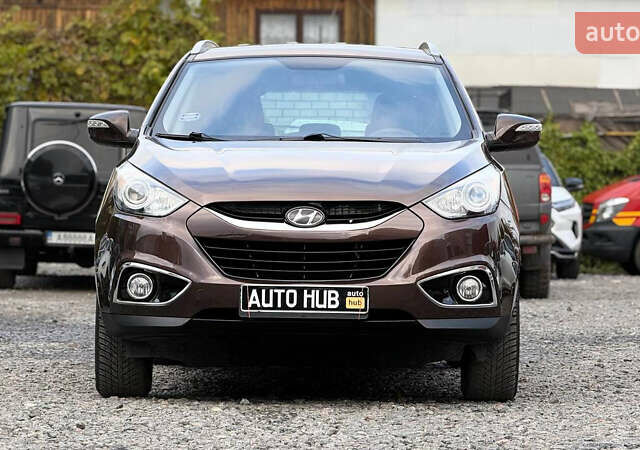 Коричневый Хендай их35, объемом двигателя 2 л и пробегом 216 тыс. км за 13900 $, фото 4 на Automoto.ua