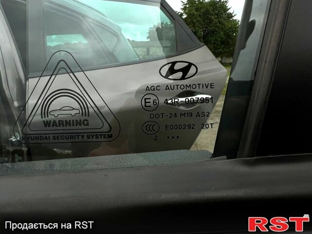 Коричневий Хендай іх35, об'ємом двигуна 2 л та пробігом 301 тис. км за 13500 $, фото 4 на Automoto.ua