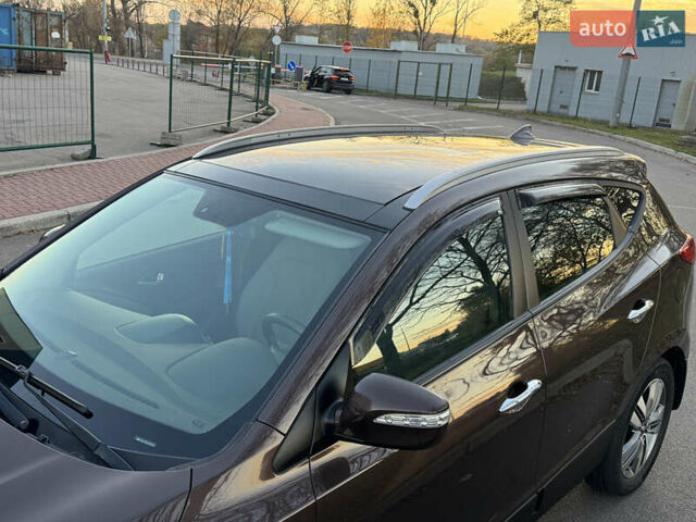 Коричневий Хендай іх35, об'ємом двигуна 2 л та пробігом 176 тис. км за 14500 $, фото 3 на Automoto.ua