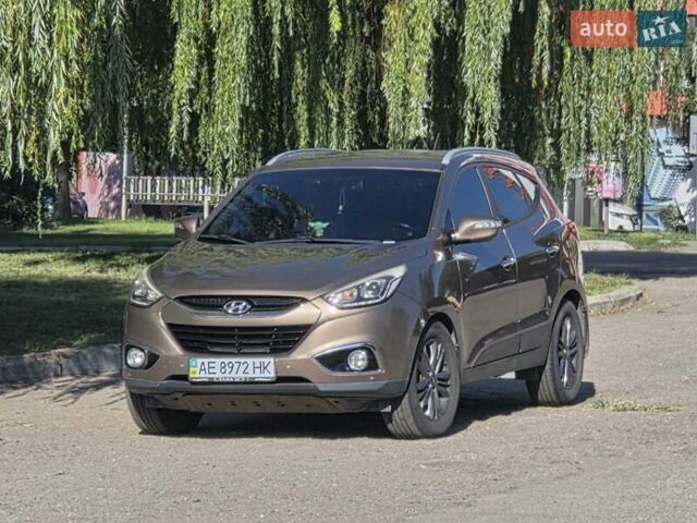 Коричневый Хендай их35, объемом двигателя 2 л и пробегом 95 тыс. км за 13000 $, фото 21 на Automoto.ua