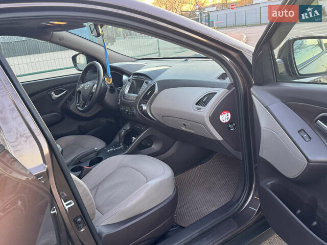 Коричневий Хендай іх35, об'ємом двигуна 2 л та пробігом 176 тис. км за 14500 $, фото 26 на Automoto.ua