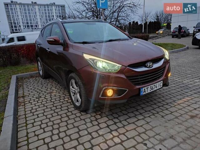 Коричневий Хендай іх35, об'ємом двигуна 2 л та пробігом 176 тис. км за 13700 $, фото 3 на Automoto.ua