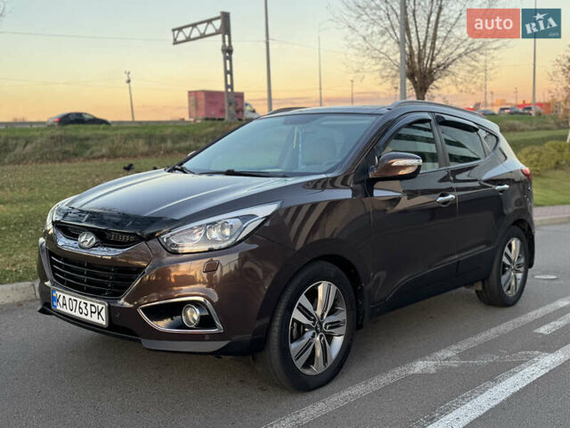 Коричневий Хендай іх35, об'ємом двигуна 2 л та пробігом 176 тис. км за 14500 $, фото 22 на Automoto.ua