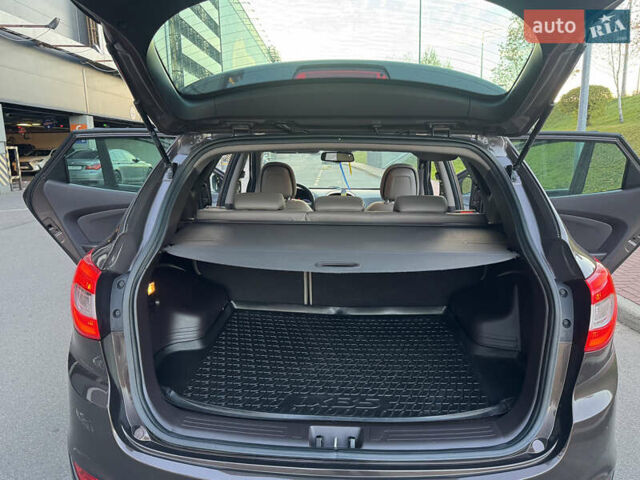 Коричневий Хендай іх35, об'ємом двигуна 2 л та пробігом 176 тис. км за 14500 $, фото 78 на Automoto.ua