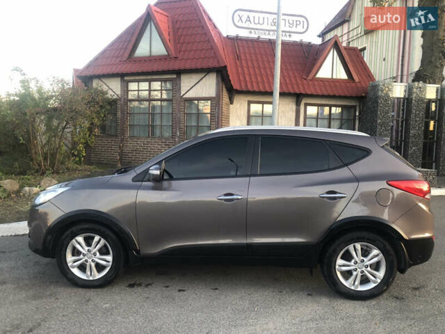 Коричневий Хендай іх35, об'ємом двигуна 2 л та пробігом 191 тис. км за 12500 $, фото 13 на Automoto.ua