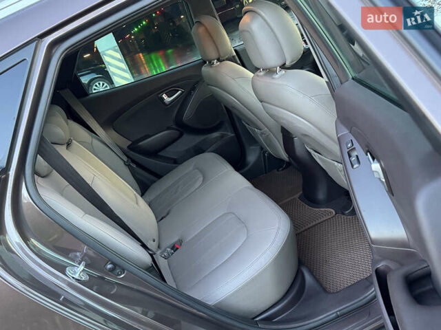 Коричневий Хендай іх35, об'ємом двигуна 2 л та пробігом 176 тис. км за 14500 $, фото 65 на Automoto.ua