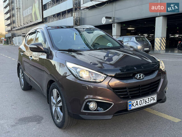 Коричневий Хендай іх35, об'ємом двигуна 2 л та пробігом 176 тис. км за 14500 $, фото 67 на Automoto.ua