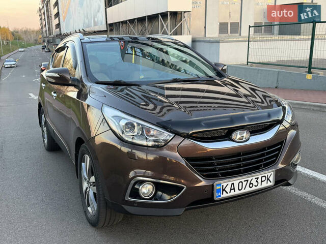 Коричневий Хендай іх35, об'ємом двигуна 2 л та пробігом 176 тис. км за 14500 $, фото 19 на Automoto.ua