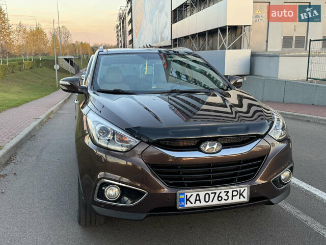 Коричневий Хендай іх35, об'ємом двигуна 2 л та пробігом 176 тис. км за 14500 $, фото 18 на Automoto.ua