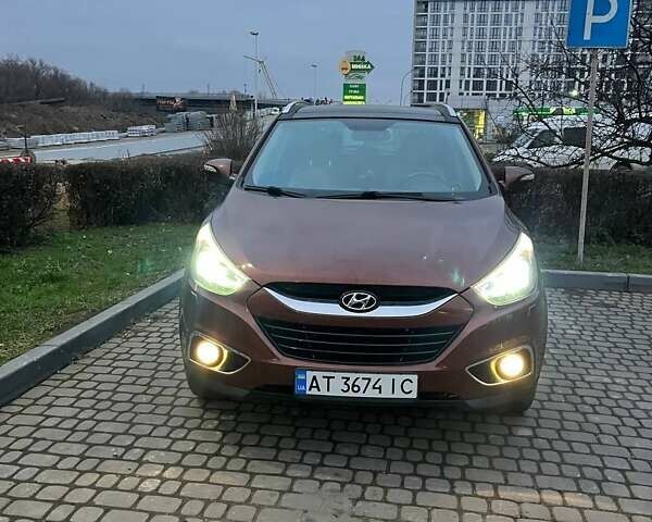 Коричневий Хендай іх35, об'ємом двигуна 2 л та пробігом 176 тис. км за 13700 $, фото 11 на Automoto.ua