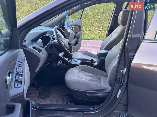 Коричневий Хендай іх35, об'ємом двигуна 2 л та пробігом 176 тис. км за 14500 $, фото 53 на Automoto.ua