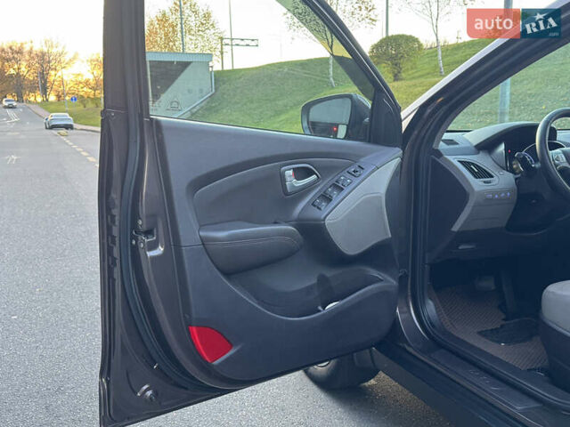 Коричневий Хендай іх35, об'ємом двигуна 2 л та пробігом 176 тис. км за 14500 $, фото 56 на Automoto.ua