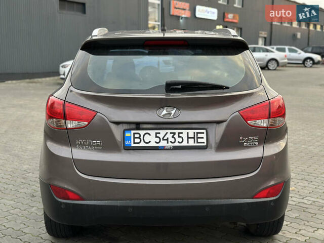 Коричневый Хендай их35, объемом двигателя 1.7 л и пробегом 217 тыс. км за 12499 $, фото 12 на Automoto.ua