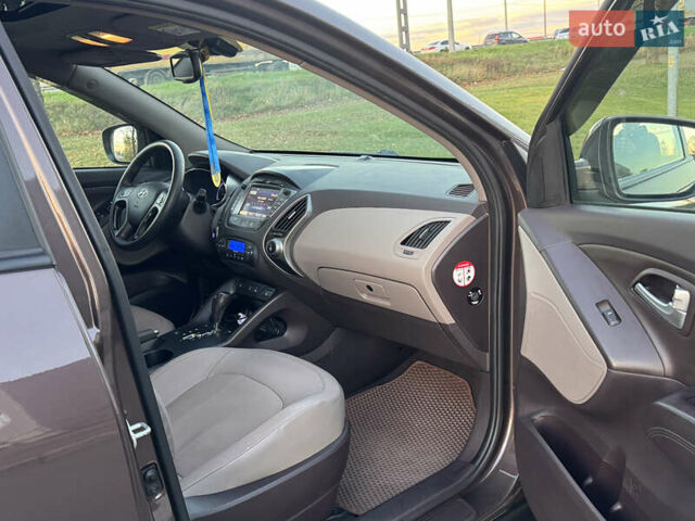 Коричневий Хендай іх35, об'ємом двигуна 2 л та пробігом 176 тис. км за 14500 $, фото 87 на Automoto.ua