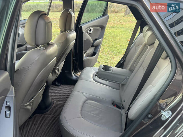 Коричневий Хендай іх35, об'ємом двигуна 2 л та пробігом 176 тис. км за 14500 $, фото 86 на Automoto.ua