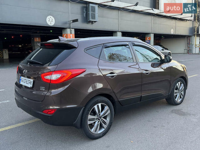 Коричневий Хендай іх35, об'ємом двигуна 2 л та пробігом 176 тис. км за 14500 $, фото 70 на Automoto.ua