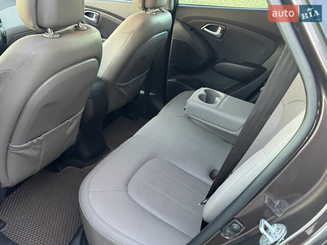 Коричневий Хендай іх35, об'ємом двигуна 2 л та пробігом 176 тис. км за 14500 $, фото 81 на Automoto.ua