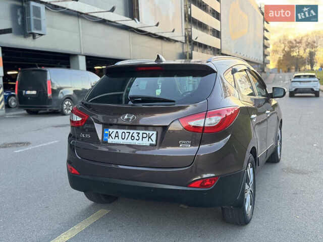 Коричневий Хендай іх35, об'ємом двигуна 2 л та пробігом 176 тис. км за 14500 $, фото 74 на Automoto.ua