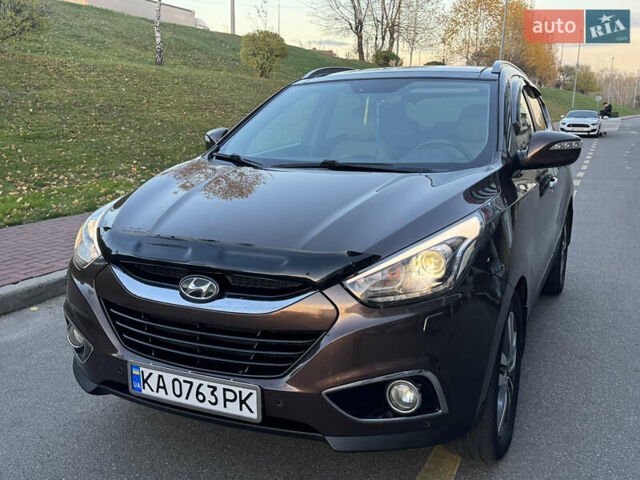 Коричневий Хендай іх35, об'ємом двигуна 2 л та пробігом 176 тис. км за 14500 $, фото 68 на Automoto.ua